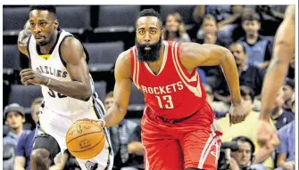  ?? BRANDON DILL / AP ?? Rockets guard James Harden, bringing the ball up the court ahead of Grizzlies forward Jeff Green in Tuesday’s exhibition game, is going all out in October to prepare himself for a long season.