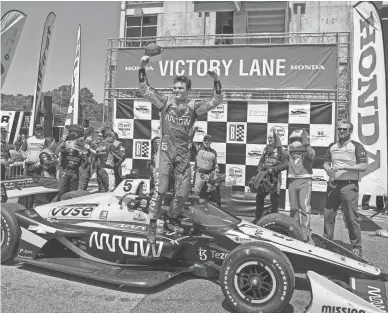  ?? MARVIN GENTRY/USA TODAY SPORTS ?? Arrow McLaren SP driver Pato O’Ward celebrates Sunday after wining the Grand Prix of Alabama at Barber Motorsport­s Park. It marked the third win of O’Ward’s career.