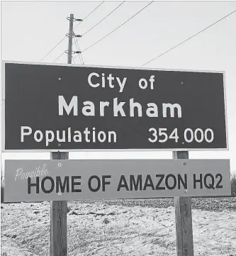  ?? CITY OF MARKHAM THE CANADIAN PRESS ?? The city of Markham — one of 10 cities that joined with Toronto to bid for the hub — tweeted a photo of a bright orange sign that dubs the city the “possible home of Amazon HQ2.”