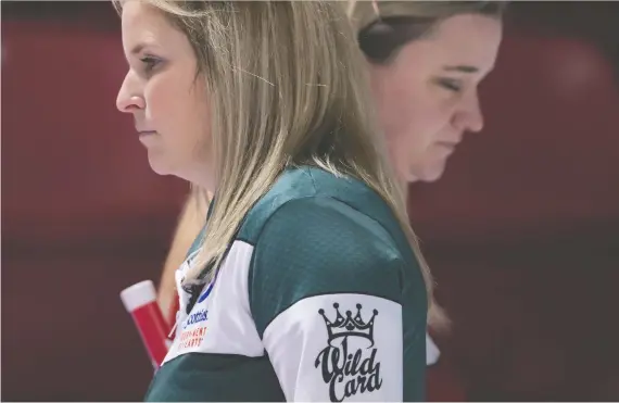  ?? THE CANADIAN PRESS ?? Skip Jennifer Jones, front, is looking to win her seventh national title. Her Team Wild Card defeated Chelsea Carey’s Team Canada 10-5 Thursday in Moose Jaw, Sask.