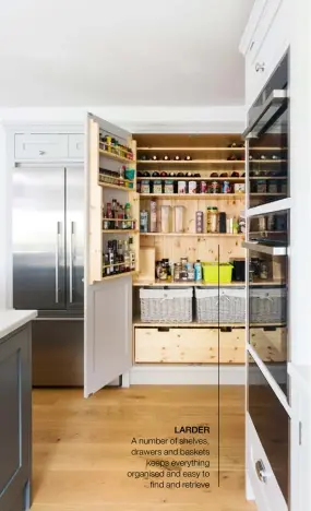  ??  ?? LARDER A number of shelves, drawers and baskets
keeps everything organised and easy to
find and retrieve