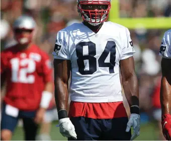 ?? NANCY LANE / BOSTON HERALD ?? ELDER STATESMAN: Tight end Ben Watson, now in his second stint with the Patriots, prepares for a drill during yesterday’s first training camp practice in Foxboro.