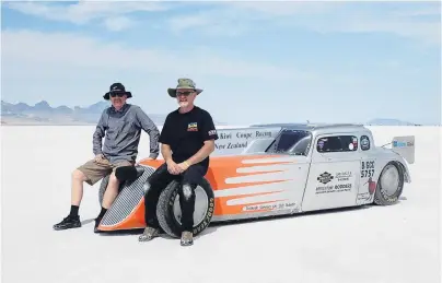  ?? PHOTO: JENNI BARNES ?? Speedsters . . . Kiwi Coupe Racing coowners Owen Jones, of Dunedin (left) and Chris Barnes, of Riverton, sit on the modified Plymouth at this year’s Bonneville Speed Week last month.