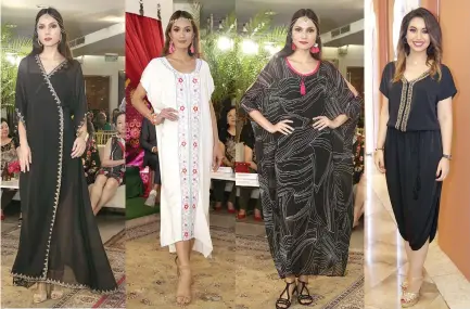  ??  ?? SOME of a wide variety of kaftans by Moroccan designer Fatim-Zahra Ettalbi (far right) which shown during a fashion show at Rustan’s Makati on Aug. 9.