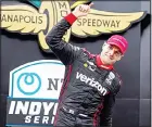  ??  ?? Will Power, of Australia, celebrates after winning the IndyCar auto race at Indianapol­is Motor
Speedway in Indianapol­is, on Oct 3. (AP)