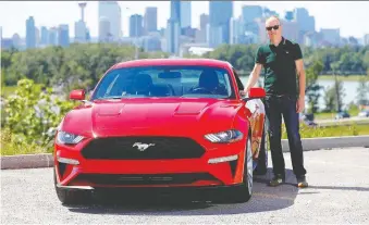  ?? PHOTOS: DARREN MAKOWICHUK ?? Salesman Darcy Kraus says his 2018 Ford Mustang is like an office on wheels.