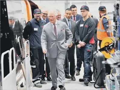  ?? PICTURE: PA PHOTO. ?? RAILWAY TOUR: The Prince of Wales sees a train being constructe­d during a visit to the CAF train factory in Newport, Wales.