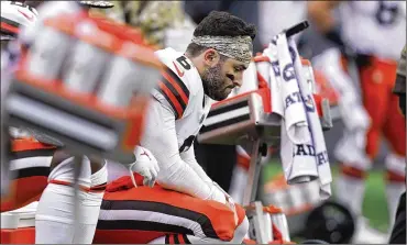  ?? STEVEN SENNE / AP ?? Cleveland Browns quarterbac­k Baker Mayfield on Wednesday said this is “probably the most beat up” he’s been in his NFL career, but he’s still planning to play against the Detroit Lions on Sunday.