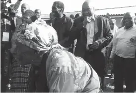  ??  ?? South African President Jacob Zuma and 101-year-old Ntolwane Primary School voting station in Nkandla yesterday. Sizeni Mbambo queue outside the News24