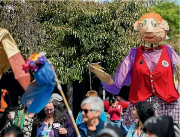  ?? PHOTO: DAVID UNWIN/ FAIRFAX NZ ?? Hundreds of women and giant puppets march down George Street in Palmerston North for Internatio­nal Women’s Day.