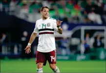  ?? ASSOCIATED PRESS ?? IN THIS IMAGE TAKEN ON MARCH 27, Mexico forward Javier Hernandez jogs across the field talking to an official, not pictured, during a internatio­nal friendly soccer match against Croatia in Arlington, Texas.