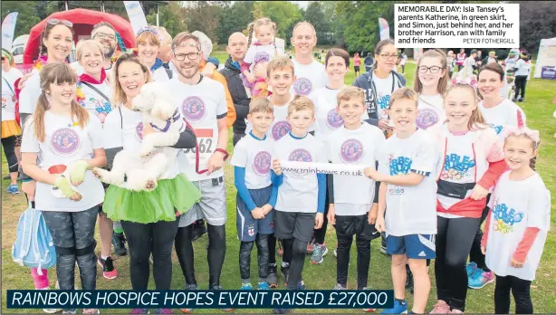  ?? PETER FOTHERGILL ?? MEMORABLE DAY: Isla Tansey’s parents Katherine, in green skirt, and Simon, just behind her, and her brother Harrison, ran with family and friends