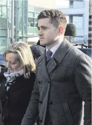  ??  ?? On trial: Paddy Jackson and (right) Blane McIlroy outside Laganside Court