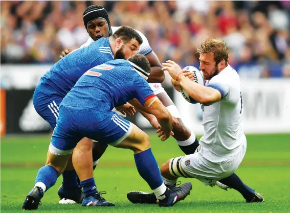  ?? PICTURE: Getty Images ?? Halted: England’s Chris Robshaw goes down in the tackle against France