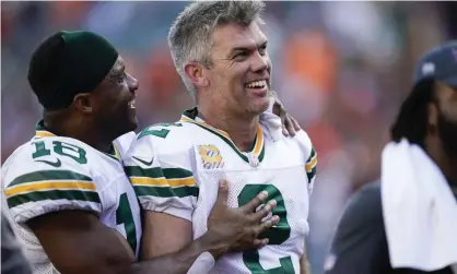  ?? Photograph: Bryan Woolston/AP ?? Mason Crosby (2) is congratula­ted by wide receiver Randall Cobb after kicking the winning field goal.