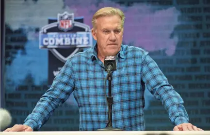  ?? MICHAEL CONROY/AP ?? Broncos general manager John Elway speaks during a news conference at the last year’s NFL combine in Indianapol­is. Denver is focusing on five candidates to replace Elway as GM.