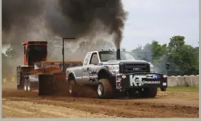  ??  ?? Put together by Ferenc X Vegh Jr., his son Nathan Vegh, and Will Hardesty, the Jumping Jack Flash Ford is one of the freshest faces on today’s Pro Stock diesel truck scene. In addition to being lifelong Ford fans, Ferenc, Nate, and Will were partially inspired by the “Trailblaze­r” Massey Ferguson campaigned by Dan and Travis Kuhns—a V-8 Pro Stock tractor that holds its own against the nastiest John Deeres in existence. If you’re fortunate enough to catch Jumping Jack Flash on a long track, it can top out at 33 mph while carrying as much as 5,400 rpm.