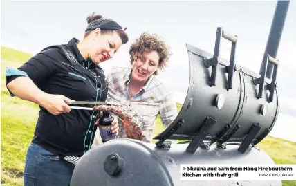  ?? HUW JOHN, CARDIFF ?? &gt; Shauna and Sam from Hang Fire Southern Kitchen with their grill