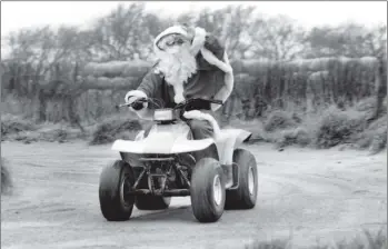  ?? 01_B49tweY05 ?? Santa arrived at Balmichael Visitor Centre last Saturday where he enjoyed a ride on a quad bike before meeting with excited children in his grotto.