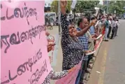  ?? (AFPl) ?? File photo of Anti-government demonstrat­ors shout slogans during a protest in front of the Fort Railway Station in Colombo