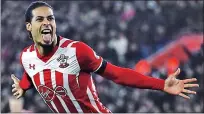  ??  ?? Wanted man: Virgil van Dijk has establishe­d himself as one of the Premier League’s most impressive centre-backs