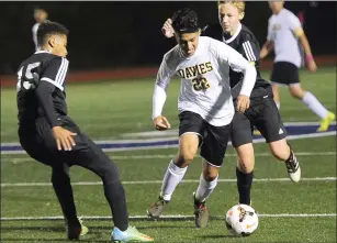  ?? File photo by Ernest A. Brown ?? Davies Tech junior winger Jose Orozco (22) has produced seven goals and six assists in the Patriots’ last two wins. Orozco had three assists in Monday’s 4-1 win over Woonsocket.