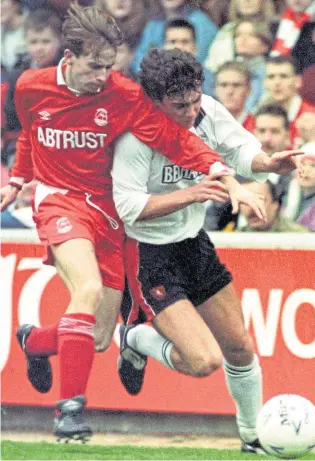  ??  ?? New head of academy Stephen Wright, left, with former Celtic and Scotland boss Gordon Strachan and academy assistant Grant Petrie; Strachan and academy coaches with the youngsters; and, above, Wright takes on Christian Dailly during a Scottish Cup clash at Pittodrie between Aberdeen and Dundee United in February 1993.