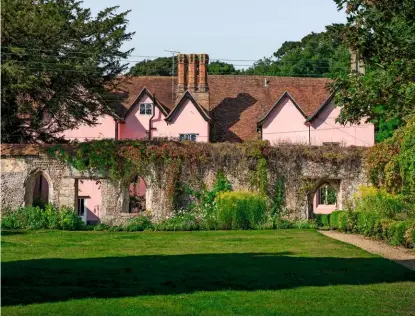  ??  ?? The 14th century house and early medieval wall of Clare Priory in Suffolk. The sudden decline of the wool trade meant houses went without modernisat­ion for many years, preserving the area’s heritage and fine architectu­re. A wooden footbridge leads back towards the country park.