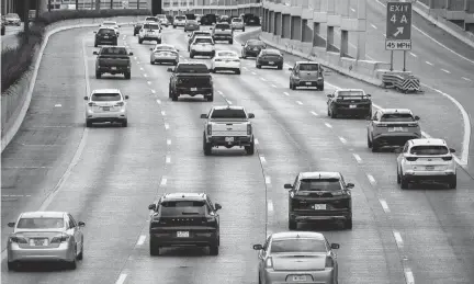  ?? SMILEY N. POOL TNS ?? Traffic flows in the 6600 block of North Central Expressway on Wednesday, April 10, in Dallas.