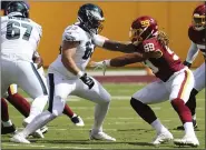  ?? DANIEL KUCIN JR. — THE ASSOCIATED PRESS ?? Washington Football Team defensive end Chase Young (99) in action against Philadelph­ia Eagles offensive tackle Jack Driscoll (63) during a match against the Philadelph­ia Eagles in an NFL game, Sunday, September 13, 2020 in Landover, Md.