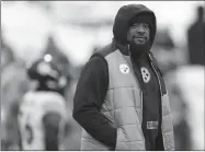  ?? Sarah Stier/Getty Images/TNS/Tribune Content ?? Pittsburgh Steelers head coach Mike Tomlin looks on before a Wild Card playoff game against the Buffalo Bills at Highmark Stadium on Jan. 15 in Orchard Park, New York.