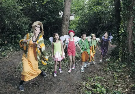  ??  ?? Sharon Bayly, left, shown with her accompanyi­ng fairies, stars in Mortal Coil Performanc­e Society’s newest outdoor production, The Faerie Play.