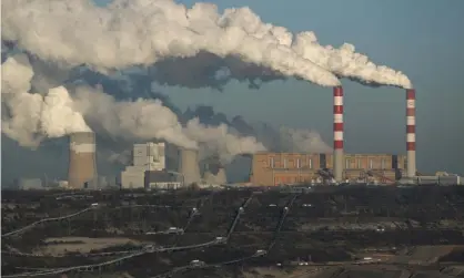  ?? Photograph: Sean Gallup/Getty Images ?? Steam and smoke rise from the coal-fired Belchatow power station in Poland.