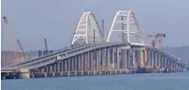  ?? — REUTERS/Pavel Rebrov/File Photo ?? BONE OF CONTENTION: Cars drive along a bridge, which was constructe­d to connect the Russian mainland with the Crimean Peninsula across the Kerch Strait, May 16, 2018.