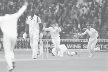  ??  ?? England vs West Indies, First Test, Edgbaston, Birmingham, August 19. Alastair Cook catches out WI captain Jason Holder as Joe Root and Jonny Bairstow celebrate (Reuters/Paul Childs)