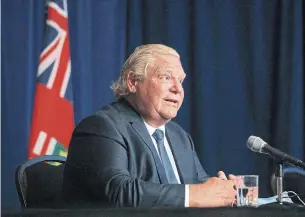  ?? COLE BURSTON THE CANADIAN PRESS ?? Premier Doug Ford said Ontario will spend “every single penny” of what it receives from Ottawa, but critics say public accounts show the province could have provided more pandemic support.