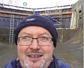  ??  ?? Alan inspecting the empty chamber of Athlone Lock, River Shannon.