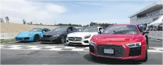  ??  ?? Four German track-day warriors: a Porsche 911, BMW M6, Mercedes AMG GT and an Audi R8.