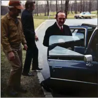  ?? The New York Times file photo ?? Fred Trump (right), President Donald Trump’s father, once helped his son make a bond payment on an Atlantic City casino by buying $3.5 million in casino chips, journalist­s and biographer­s say.