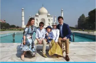  ??  ?? AGRA: Prime Minister of Canada Justin Trudeau, his wife Sophie Gregoire and his children pose for a photograph during their visit to Taj Mahal in Agra yesterday. —AFP