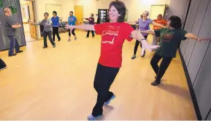  ?? ADOLPHE PIERRE-LOUIS/JOURNAL ?? Terri Tobey leads an enhance fitness class at the North Valley Senior Center.