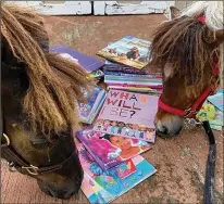  ?? CAITLIN GOOCH ?? Caitlin Gooch’s ponies visit students at community events in the Raleigh, North Carolina, area. The children pick a book to read to the ponies and can then take the book home.