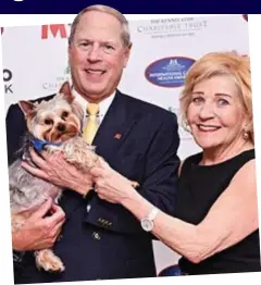  ??  ?? Under pressure: Hill with his wife Shirley and pet dog