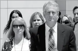  ?? ASSOCIATED PRESS ?? IN THIS JUNE 2017 FILE PHOTO, former Arizona Corporatio­n Commission­er Gary Pierce, and his wife Sherry, left, leave court in Phoenix after being arraigned on bribery and fraud charges.