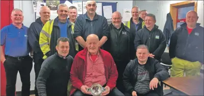  ??  ?? Oban man Neil MacKechnie retired from Argyll and Bute Roads Department after 25 years service on Thursday November 30. Neil received a quaich from the council, presented by Donald Campbell, and various presents from his colleagues.