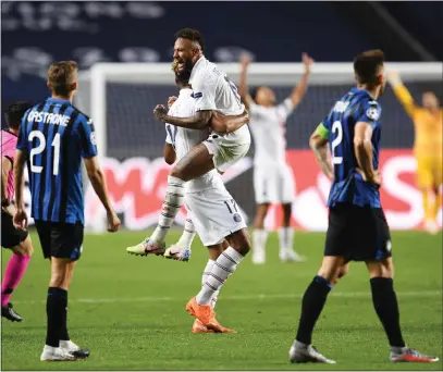  ??  ?? Neymar celebrates with Paris Saint-Germain match-winner Eric Maxim Choupo-Moting