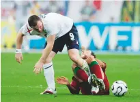  ??  ?? Sent off...Rooney stamps on Ricardo Carvalho at the 2006 World Cup