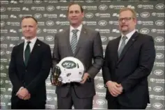  ?? SETH WENIG - THE ASSOCIATED PRESS ?? New York Jets new NFL football head coach Adam Gase, center, poses for a picture with owner Christophe­r Johnson, left, and general manager Mike Maccagnan during a news conference in Florham Park, N.J., Monday, Jan. 14, 2019.