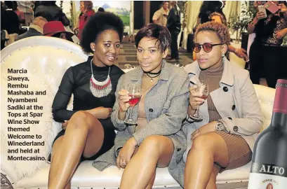  ??  ?? Marcia Siweya, Rembu Mashaba and Nyambeni Sadiki at the Tops at Spar Wine Show themed Welcome to Winederlan­d and held at Montecasin­o.