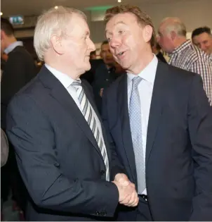  ??  ?? Deputy Tony McLoughlin offers his commiserat­ions to party colleague Gerry Reynolds.